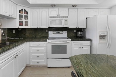 Presenting a stunning 2 BR., 2.5 BA. condo, boasting picturesque on Fontainebleau Golf Course in Florida - for sale on GolfHomes.com, golf home, golf lot