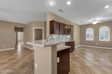 Welcome to this charming 2-bedroom plus den, 2-bathroom home on Cimarron Golf Club in Arizona - for sale on GolfHomes.com, golf home, golf lot