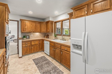 Backed directly to the 16th fairway of The Olde on The Olde Course At Loveland in Colorado - for sale on GolfHomes.com, golf home, golf lot