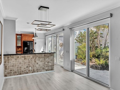 Experience the best of Florida living in this elegant courtyard on The Boca Country Club in Florida - for sale on GolfHomes.com, golf home, golf lot