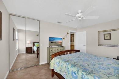 A brand-new metal roof & water views from the oversized lanai on The Florida Club in Florida - for sale on GolfHomes.com, golf home, golf lot