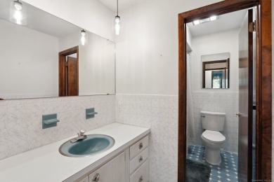 Welcome to 174 Kohanza Street - a generously sized mid-century on Ridgewood Country Club in Connecticut - for sale on GolfHomes.com, golf home, golf lot