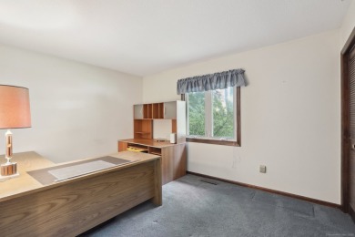 Welcome to 174 Kohanza Street - a generously sized mid-century on Ridgewood Country Club in Connecticut - for sale on GolfHomes.com, golf home, golf lot