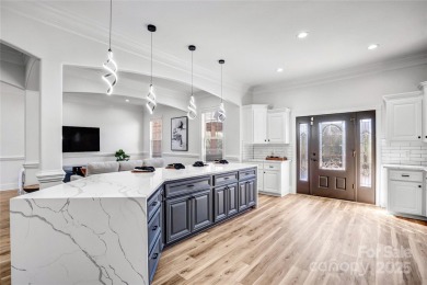 Experience luxury and privacy on over an acre in Mooresville's on Mallard Head Country Club in North Carolina - for sale on GolfHomes.com, golf home, golf lot