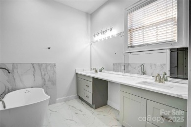 Experience luxury and privacy on over an acre in Mooresville's on Mallard Head Country Club in North Carolina - for sale on GolfHomes.com, golf home, golf lot