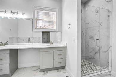 Experience luxury and privacy on over an acre in Mooresville's on Mallard Head Country Club in North Carolina - for sale on GolfHomes.com, golf home, golf lot