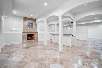 Experience luxury and privacy on over an acre in Mooresville's on Mallard Head Country Club in North Carolina - for sale on GolfHomes.com, golf home, golf lot