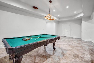 Experience luxury and privacy on over an acre in Mooresville's on Mallard Head Country Club in North Carolina - for sale on GolfHomes.com, golf home, golf lot