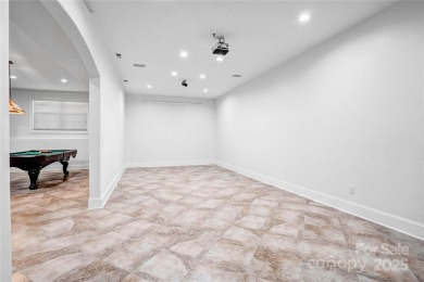 Experience luxury and privacy on over an acre in Mooresville's on Mallard Head Country Club in North Carolina - for sale on GolfHomes.com, golf home, golf lot