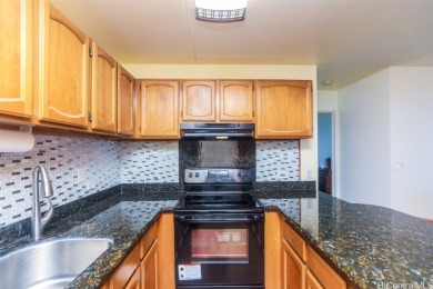 This highly desirable and conveniently situated 15th-floor on Ala Wai Golf Course in Hawaii - for sale on GolfHomes.com, golf home, golf lot