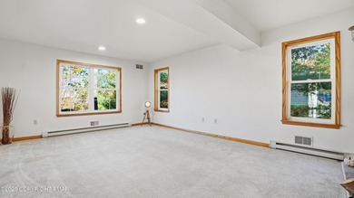 WELCOME TO 104 WOLF HOLLOW RD, A GOLF LOVERS DREAM!! Situated on Split Rock Resort and Country Club in Pennsylvania - for sale on GolfHomes.com, golf home, golf lot