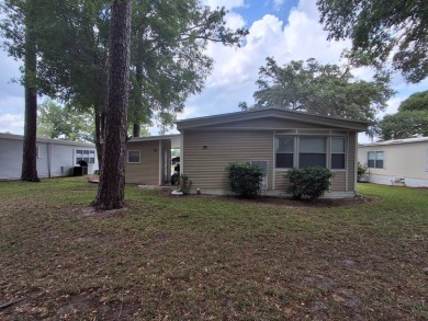 2BR/2BA Home with Modern Touches | Rolling Greens Village on Rolling Greens Executive Golf Community in Florida - for sale on GolfHomes.com, golf home, golf lot