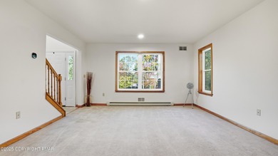 WELCOME TO 104 WOLF HOLLOW RD, A GOLF LOVERS DREAM!! Situated on Split Rock Resort and Country Club in Pennsylvania - for sale on GolfHomes.com, golf home, golf lot
