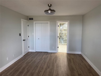 Luxury fully renovated 2BR/2BA golf course and lake view condo on Feather Sound Country Club in Florida - for sale on GolfHomes.com, golf home, golf lot