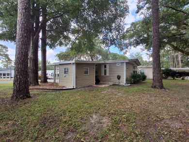 2BR/2BA Home with Modern Touches | Rolling Greens Village on Rolling Greens Executive Golf Community in Florida - for sale on GolfHomes.com, golf home, golf lot