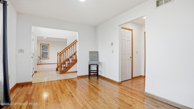 WELCOME TO 104 WOLF HOLLOW RD, A GOLF LOVERS DREAM!! Situated on Split Rock Resort and Country Club in Pennsylvania - for sale on GolfHomes.com, golf home, golf lot