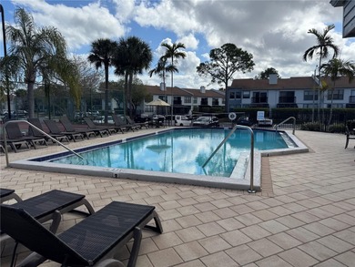Luxury fully renovated 2BR/2BA golf course and lake view condo on Feather Sound Country Club in Florida - for sale on GolfHomes.com, golf home, golf lot