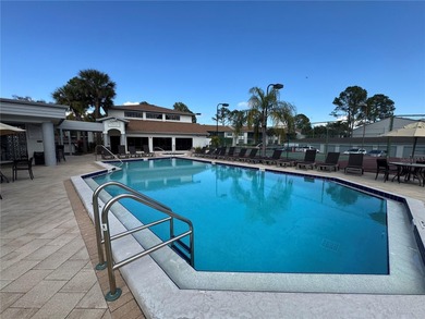 Luxury fully renovated 2BR/2BA golf course and lake view condo on Feather Sound Country Club in Florida - for sale on GolfHomes.com, golf home, golf lot