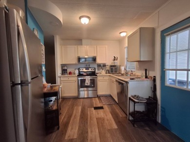 2BR/2BA Home with Modern Touches | Rolling Greens Village on Rolling Greens Executive Golf Community in Florida - for sale on GolfHomes.com, golf home, golf lot