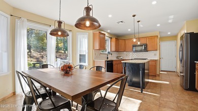 WELCOME TO 104 WOLF HOLLOW RD, A GOLF LOVERS DREAM!! Situated on Split Rock Resort and Country Club in Pennsylvania - for sale on GolfHomes.com, golf home, golf lot