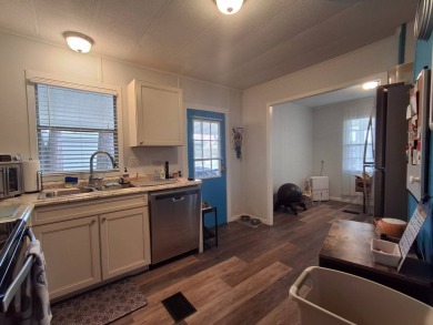 2BR/2BA Home with Modern Touches | Rolling Greens Village on Rolling Greens Executive Golf Community in Florida - for sale on GolfHomes.com, golf home, golf lot