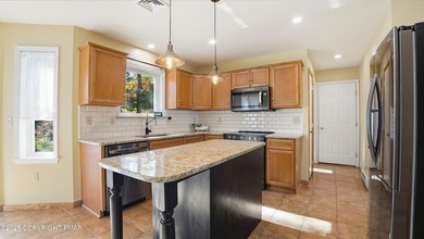 WELCOME TO 104 WOLF HOLLOW RD, A GOLF LOVERS DREAM!! Situated on Split Rock Resort and Country Club in Pennsylvania - for sale on GolfHomes.com, golf home, golf lot