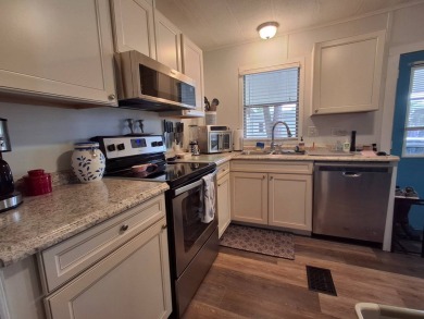 2BR/2BA Home with Modern Touches | Rolling Greens Village on Rolling Greens Executive Golf Community in Florida - for sale on GolfHomes.com, golf home, golf lot