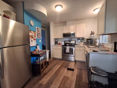2BR/2BA Home with Modern Touches | Rolling Greens Village on Rolling Greens Executive Golf Community in Florida - for sale on GolfHomes.com, golf home, golf lot