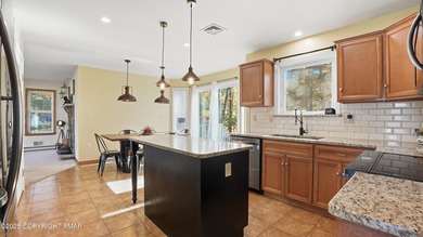 WELCOME TO 104 WOLF HOLLOW RD, A GOLF LOVERS DREAM!! Situated on Split Rock Resort and Country Club in Pennsylvania - for sale on GolfHomes.com, golf home, golf lot