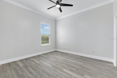 One or more photo(s) has been virtually staged. This stunning on Stonecrest Golf and Club Club in Florida - for sale on GolfHomes.com, golf home, golf lot