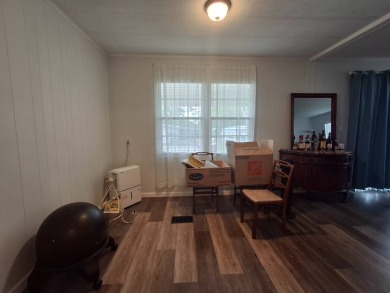 2BR/2BA Home with Modern Touches | Rolling Greens Village on Rolling Greens Executive Golf Community in Florida - for sale on GolfHomes.com, golf home, golf lot