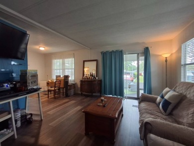 2BR/2BA Home with Modern Touches | Rolling Greens Village on Rolling Greens Executive Golf Community in Florida - for sale on GolfHomes.com, golf home, golf lot
