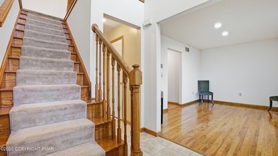 WELCOME TO 104 WOLF HOLLOW RD, A GOLF LOVERS DREAM!! Situated on Split Rock Resort and Country Club in Pennsylvania - for sale on GolfHomes.com, golf home, golf lot
