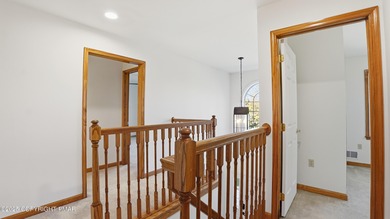 WELCOME TO 104 WOLF HOLLOW RD, A GOLF LOVERS DREAM!! Situated on Split Rock Resort and Country Club in Pennsylvania - for sale on GolfHomes.com, golf home, golf lot