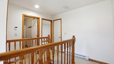 WELCOME TO 104 WOLF HOLLOW RD, A GOLF LOVERS DREAM!! Situated on Split Rock Resort and Country Club in Pennsylvania - for sale on GolfHomes.com, golf home, golf lot