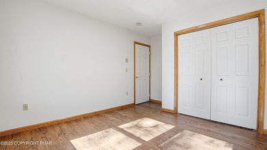 WELCOME TO 104 WOLF HOLLOW RD, A GOLF LOVERS DREAM!! Situated on Split Rock Resort and Country Club in Pennsylvania - for sale on GolfHomes.com, golf home, golf lot