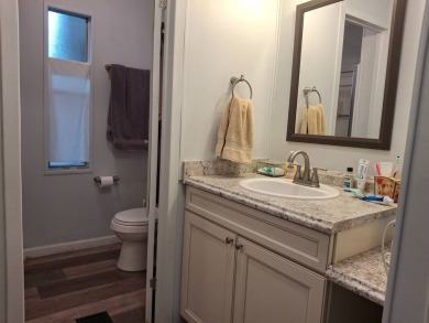 2BR/2BA Home with Modern Touches | Rolling Greens Village on Rolling Greens Executive Golf Community in Florida - for sale on GolfHomes.com, golf home, golf lot