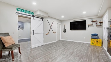 WELCOME TO 104 WOLF HOLLOW RD, A GOLF LOVERS DREAM!! Situated on Split Rock Resort and Country Club in Pennsylvania - for sale on GolfHomes.com, golf home, golf lot