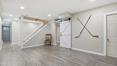 WELCOME TO 104 WOLF HOLLOW RD, A GOLF LOVERS DREAM!! Situated on Split Rock Resort and Country Club in Pennsylvania - for sale on GolfHomes.com, golf home, golf lot