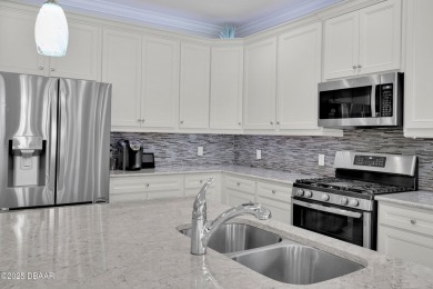 Tropical-inspired Coconut model single-family pool & spa home on LPGA International Golf Course in Florida - for sale on GolfHomes.com, golf home, golf lot