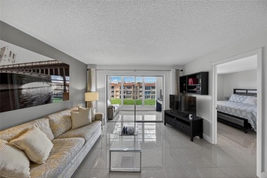 Welcome to this spacious and fully furnished 2-bedroom, 2-bath on Sunrise Lakes Phase III in Florida - for sale on GolfHomes.com, golf home, golf lot