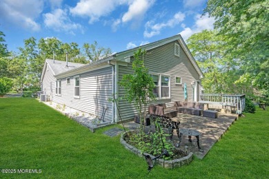 Exceptional greenport model home on quiet cul-de-sac backing to on Greenbriar Woodlands in New Jersey - for sale on GolfHomes.com, golf home, golf lot