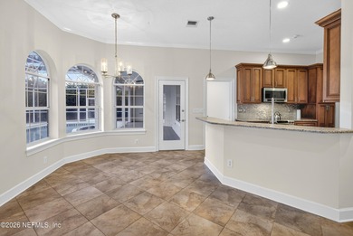 Discover refined luxury in the exclusive gated community of on Jacksonville Golf and Country Club in Florida - for sale on GolfHomes.com, golf home, golf lot