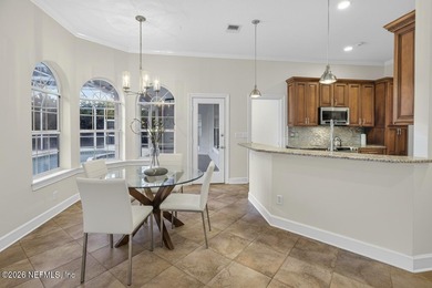 Discover refined luxury in the exclusive gated community of on Jacksonville Golf and Country Club in Florida - for sale on GolfHomes.com, golf home, golf lot