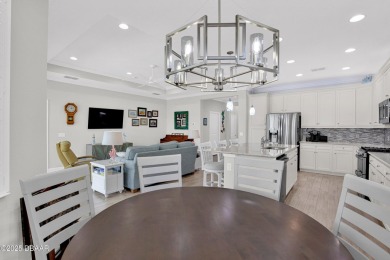 Tropical-inspired Coconut model single-family pool & spa home on LPGA International Golf Course in Florida - for sale on GolfHomes.com, golf home, golf lot