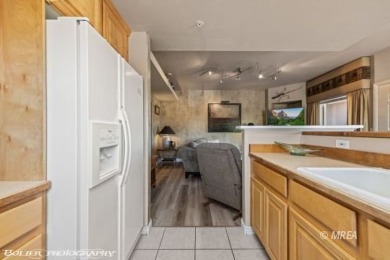 Check out this great condo with an amazing front courtyard on Wolf Creek At Paradise Canyon in Nevada - for sale on GolfHomes.com, golf home, golf lot