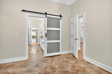 Discover refined luxury in the exclusive gated community of on Jacksonville Golf and Country Club in Florida - for sale on GolfHomes.com, golf home, golf lot