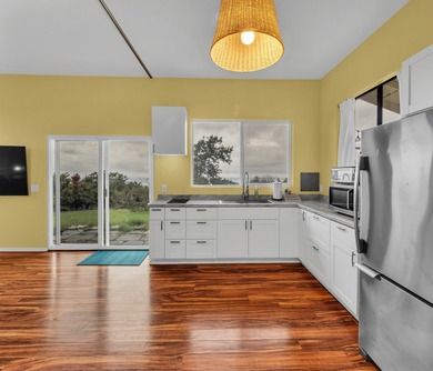 This lovely, well-cared-for home is located in desirable Mark on Discovery Harbour Golf Course in Hawaii - for sale on GolfHomes.com, golf home, golf lot