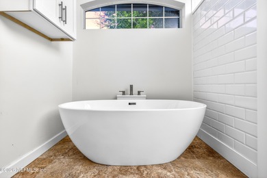 Discover refined luxury in the exclusive gated community of on Jacksonville Golf and Country Club in Florida - for sale on GolfHomes.com, golf home, golf lot