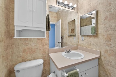 This well-maintained, turn-key property offers a perfect blend on Falcon Watch Golf Club in Florida - for sale on GolfHomes.com, golf home, golf lot